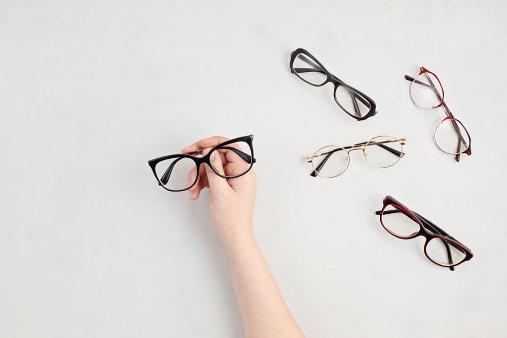 woman hand holding eyeglasses optical store glas 2021 09 03 21 11 08 utc copy